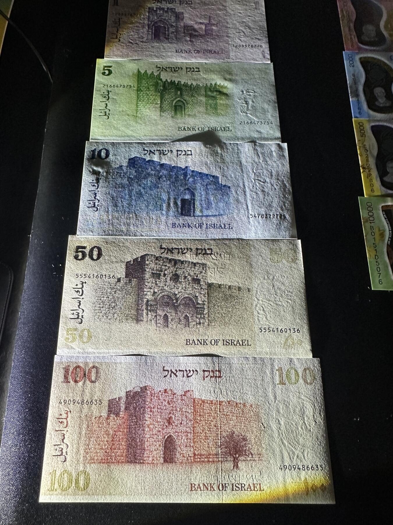 《外钞收藏家》第五百九十期（欧洲强钞、港币、硬通货及丰富裸币大拍场）（本平台长期征集拍品、欢迎藏友们联系合作） 1978、79年以色列1-100谢克尔 五张一起 全新UNC 有2个边上轻微荧光反应