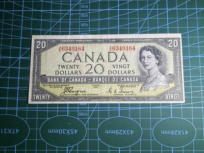 【炜奕收藏】，第五十二期 - 1954年加拿大20元，品相如图，魔鬼脸版