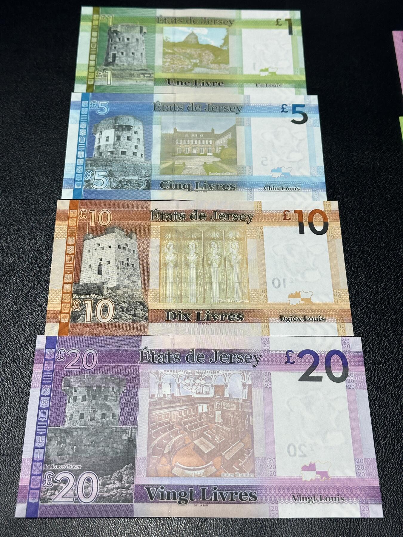 《外钞收藏家》第五百九十期（欧洲强钞、港币、硬通货及丰富裸币大拍场）（本平台长期征集拍品、欢迎藏友们联系合作） 泽西1、5、10、20镑 4张一起 全新UNC 全部是靓号尾3 但1和20镑有轻微潮点