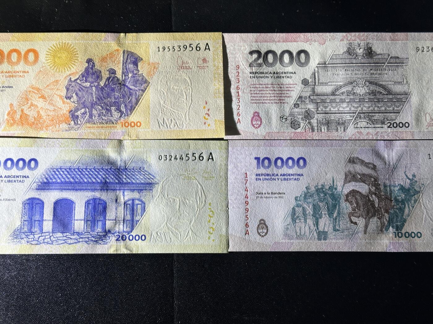 《外钞收藏家》第五百九十期（欧洲强钞、港币、硬通货及丰富裸币大拍场）（本平台长期征集拍品、欢迎藏友们联系合作） 阿根廷1000-2万面额 四张一起 全新UNC 尾6 A冠