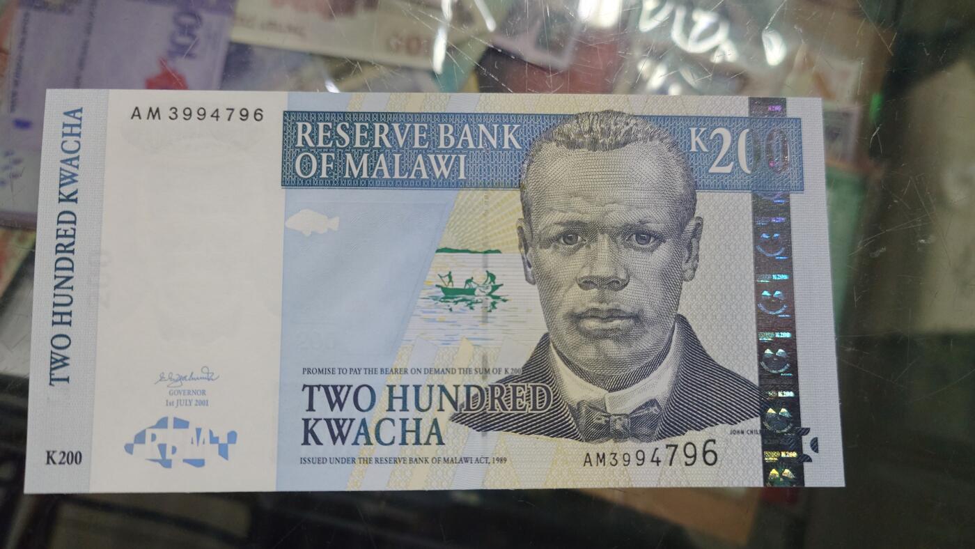 世界钱币～微拍第218期暨2025年第58期  老库存低价起拍 2001年马拉维200 全新绝品尾号796