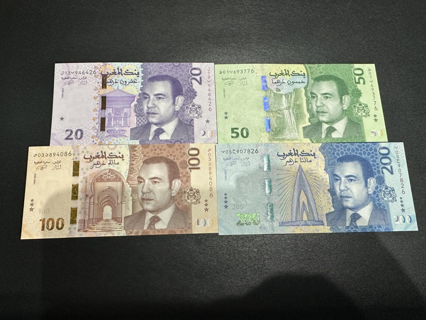 《外钞收藏家》第五百九十期（欧洲强钞、港币、硬通货及丰富裸币大拍场）（本平台长期征集拍品、欢迎藏友们联系合作） 摩洛哥20-100面额 四张一起 全新UNC 全部是靓号尾6