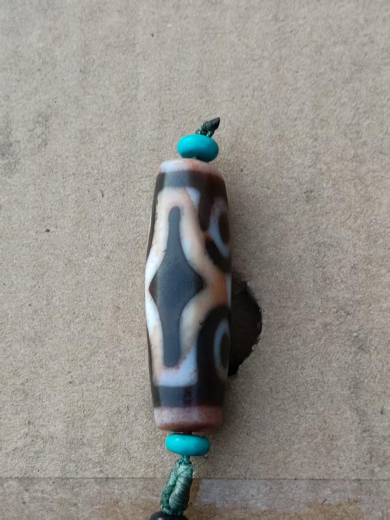 藏传四眼硃砂天珠