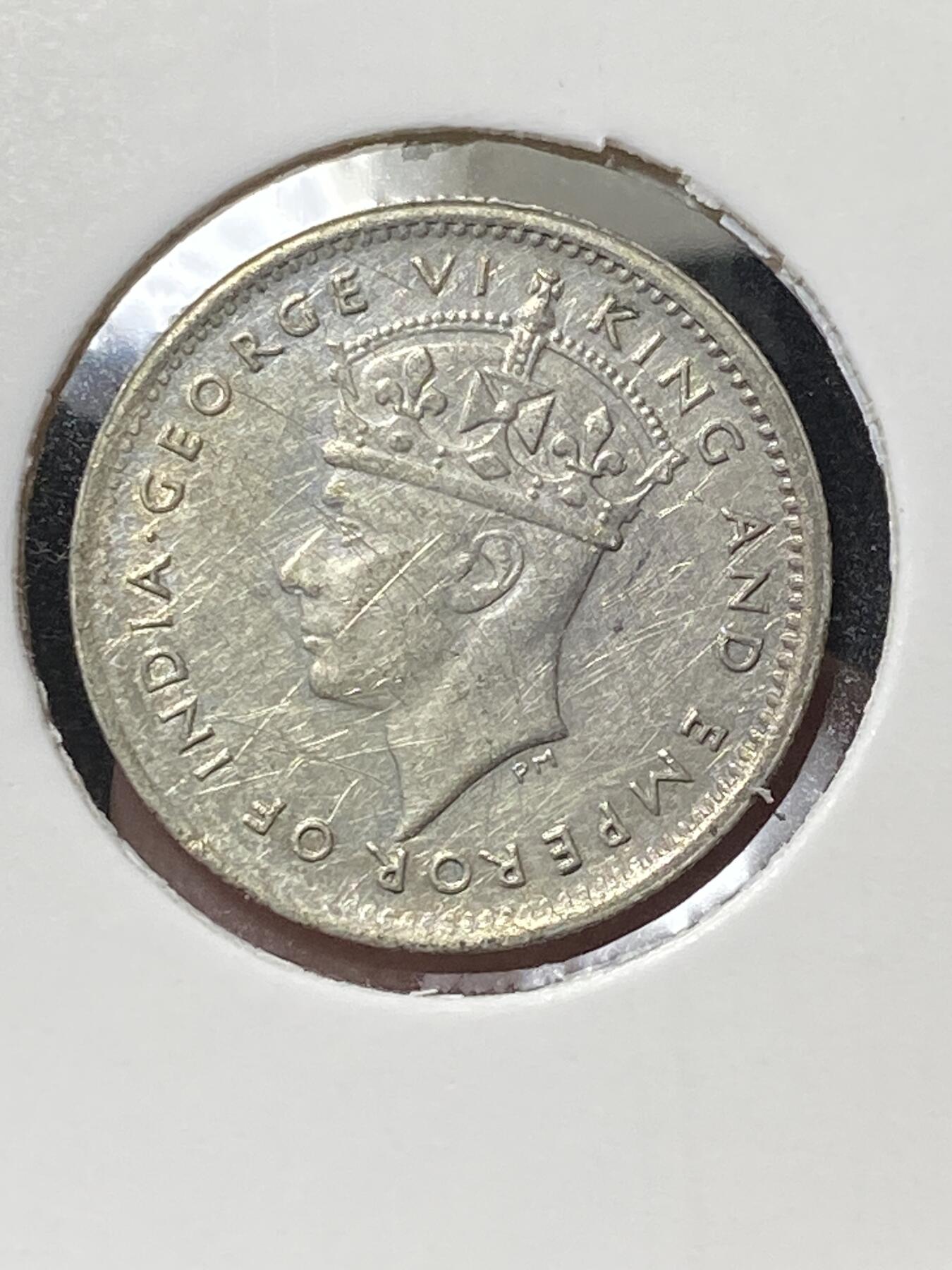 2025年第一百三十三场(总第一百五十九场）外国好品纸夹散币场(免佣金) 英属锡兰1941单年份10分银币(乔治六世第一套第一版，550银)