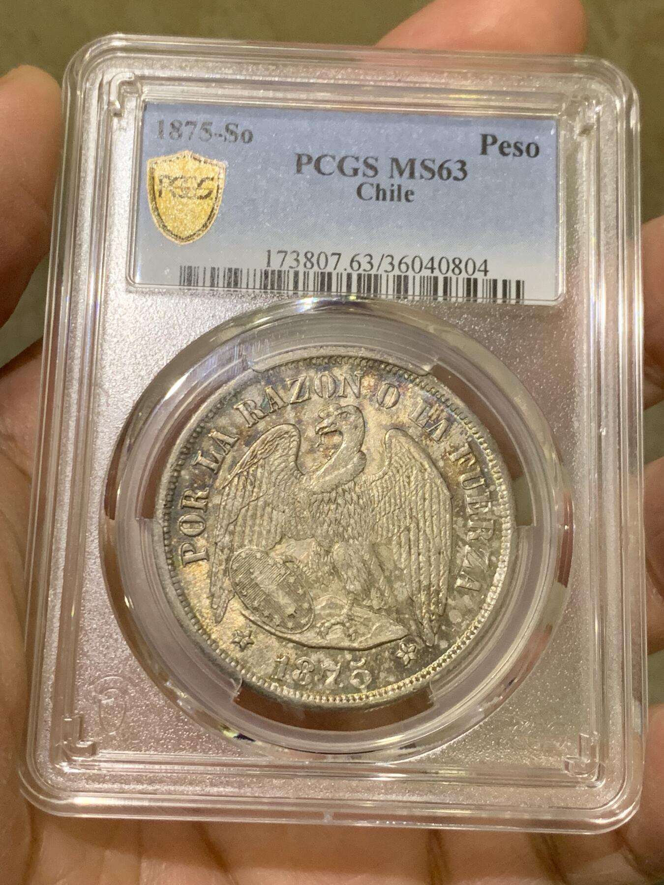 《竞宝斋》第444场 周日，周一，2场连拍 （全场包邮） PCGS MS63 智利 1875年 1比索 安第斯神鹰 银币 五彩包浆 季军分 更高分仅3枚
