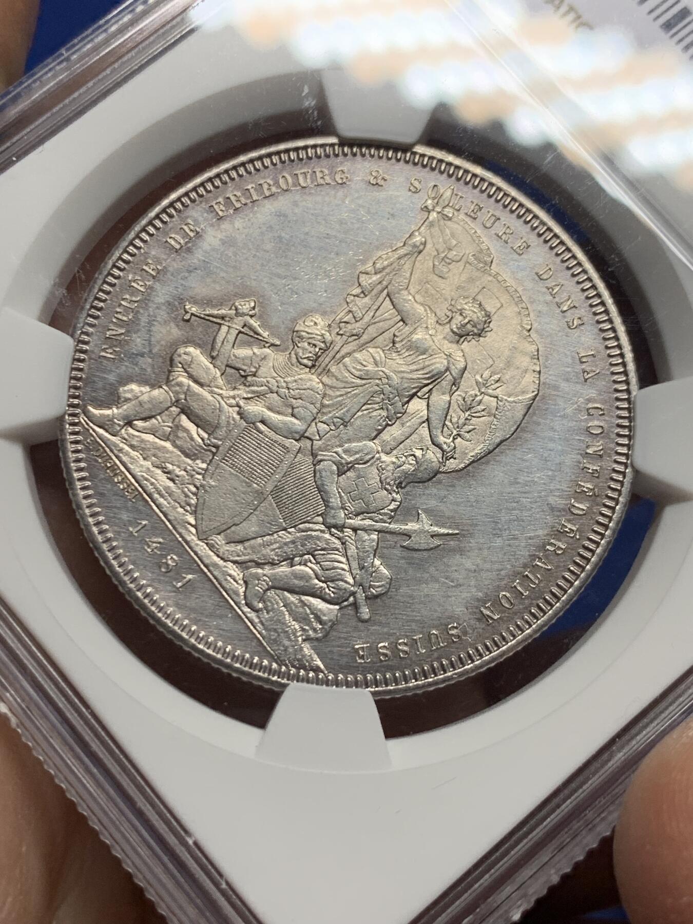 《竞宝斋》第444场 周日，周一，2场连拍 （全场包邮） NGC UNC 1881年瑞士弗莱堡射击节景观5法郎银币，双面PL状态不错。