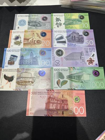 《外钞收藏家》第五百九十期（欧洲强钞、港币、硬通货及丰富裸币大拍场）（本平台长期征集拍品、欢迎藏友们联系合作） - 尼加拉瓜5-1000面额 9张一起 全新UNC 全部是靓号尾0 期中50有2张 一张纪念钞