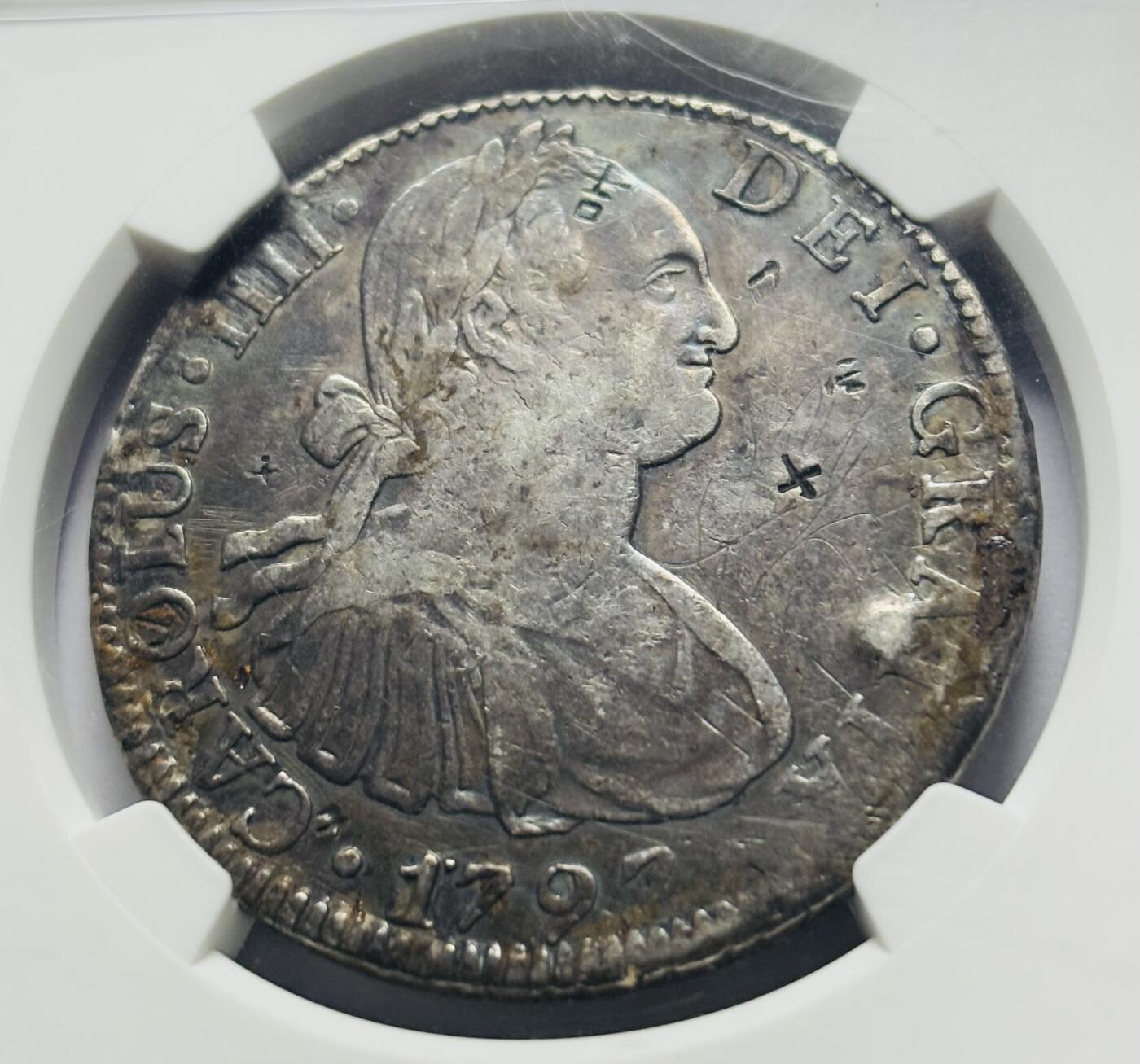 文馨钱币收藏第 283 场，【大雪鉴珍，寒英缀金】金银纪念币精品场，诚邀您的参与【长期接代拍品】 1797 年西属墨西哥 8 里亚尔大银币，NGC评级，有加盖戳记，说明了当时货币交易流通频繁的历史荣光