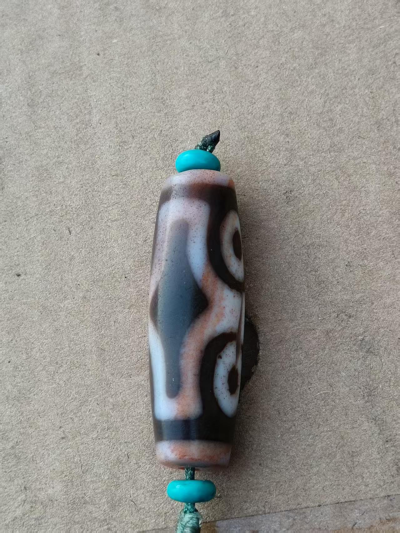 藏传四眼硃砂天珠