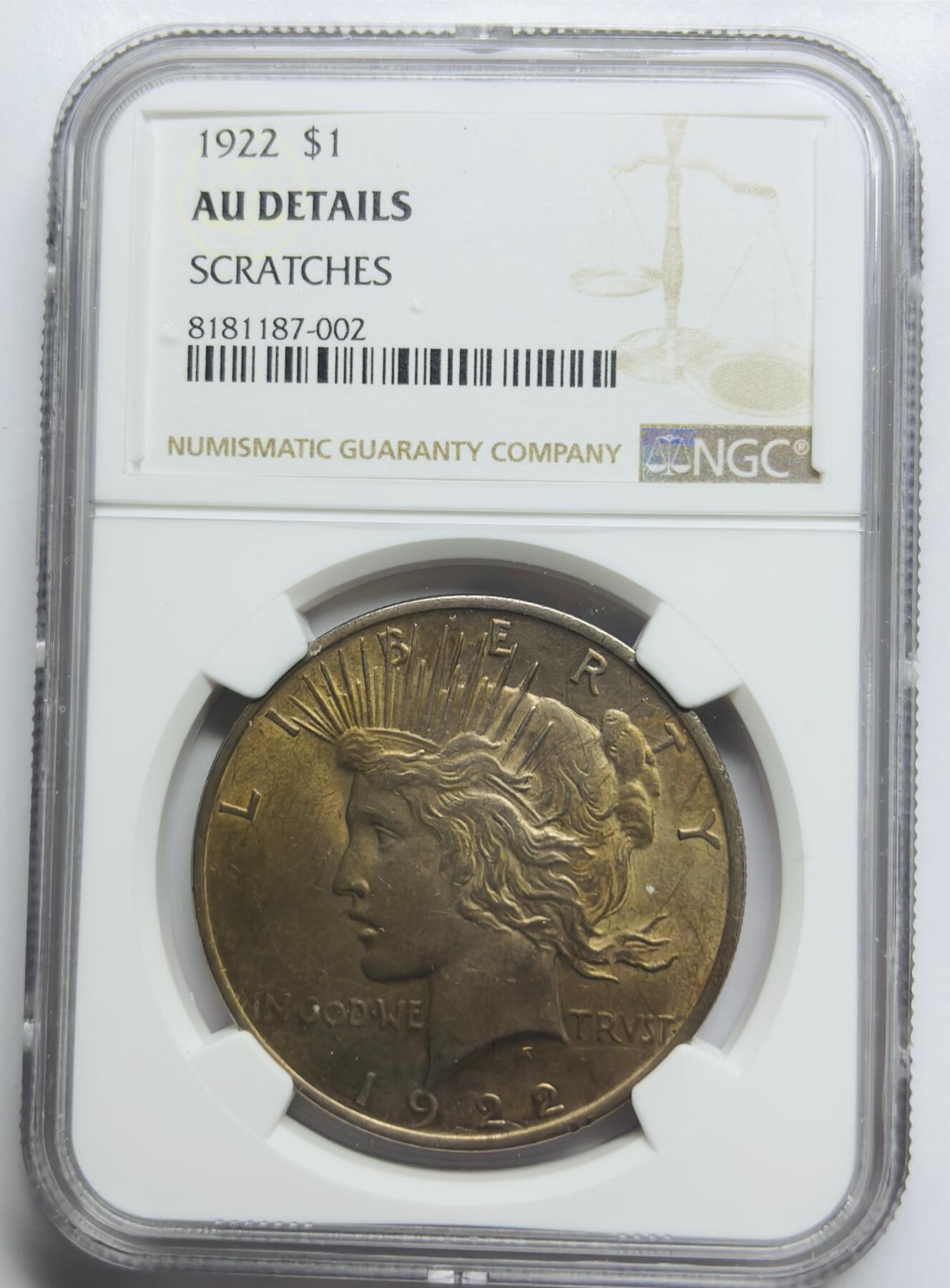 文馨钱币收藏第 283 场，【大雪鉴珍，寒英缀金】金银纪念币精品场，诚邀您的参与【长期接代拍品】 1922 年美国和平鸽一元银元，NGC 评级 AUD，金色包浆立体饱满，整体金黄状态，视觉感拉满