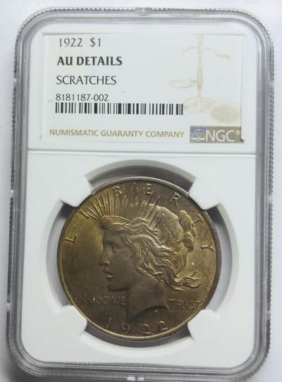 文馨钱币收藏第 283 场，【大雪鉴珍，寒英缀金】金银纪念币精品场，诚邀您的参与【长期接代拍品】 - 1922 年美国和平鸽一元银元，NGC 评级 AUD，金色包浆立体饱满，整体金黄状态，视觉感拉满
