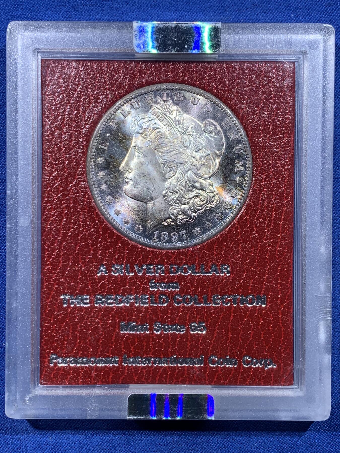 《竞宝斋》第444场 周日，周一，2场连拍 （全场包邮） NGC MS64 美国1897年S版 摩根1美元 银币，正宗“Redfield派拉蒙”集藏原盒，国内极其少见，五彩包浆、超强转光、优秀底板状态一个不漏。