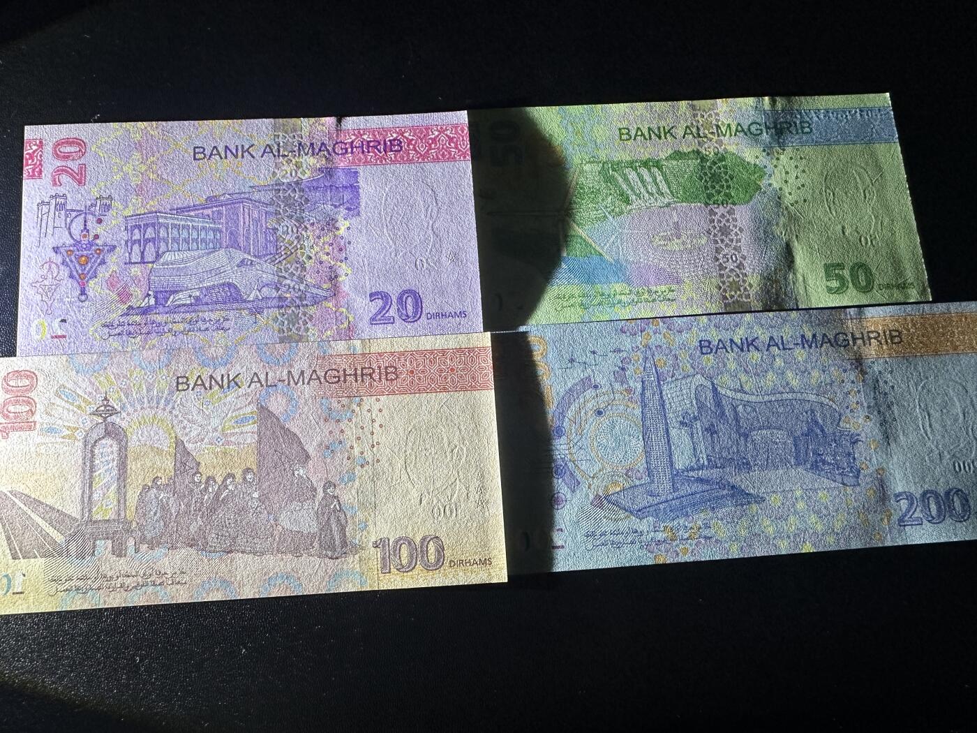 《外钞收藏家》第五百九十期（欧洲强钞、港币、硬通货及丰富裸币大拍场）（本平台长期征集拍品、欢迎藏友们联系合作） 摩洛哥20-100面额 四张一起 全新UNC 全部是靓号尾6