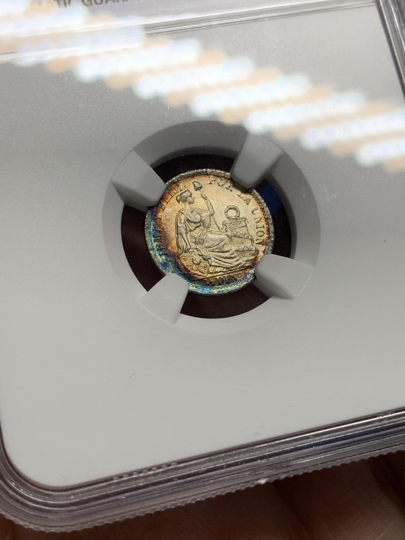 《竞宝斋》第444场 周日，周一，2场连拍 （全场包邮） NGC MS64 秘鲁1903年1/2蒂娜尔银币，双面带有月牙蓝彩包浆，十分亮眼的一枚，早期年份少见