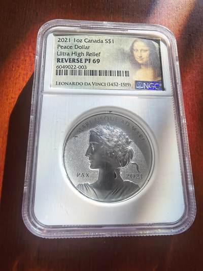 长老汇蛇年精选第七十八场拍卖 - 2021加拿大和平1加元超高浮雕反向精制银币，NGC PF69