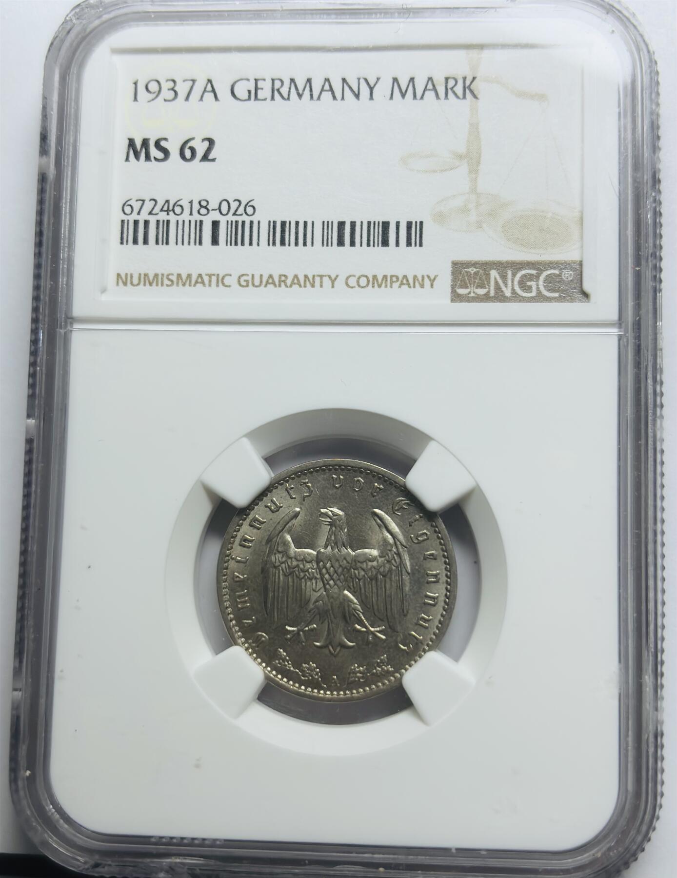文馨钱币收藏第 283 场，【大雪鉴珍，寒英缀金】金银纪念币精品场，诚邀您的参与【长期接代拍品】 1937 年德国 1 马克镍币 A 版 NGC 评级 MS62 分，羽毛清晰可数，字口深俊，少见的好品，62 分实为低评状态