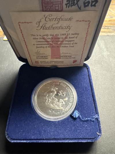 ❤️【币观天下】❤️ 第333期钱币拍卖- 2025.12.5周五晚上6点半场-长期征集拍品 - 新加坡1989年联合国拯救儿童基金会成立70周年精制纪念银币盒证齐全