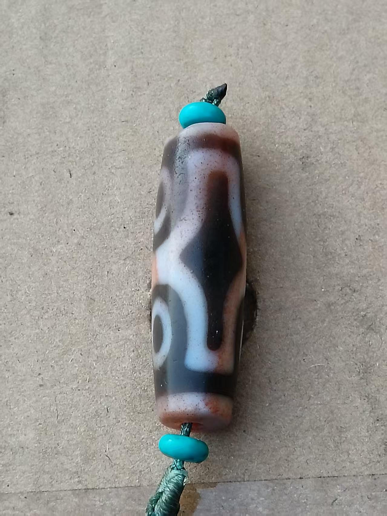 藏传四眼硃砂天珠