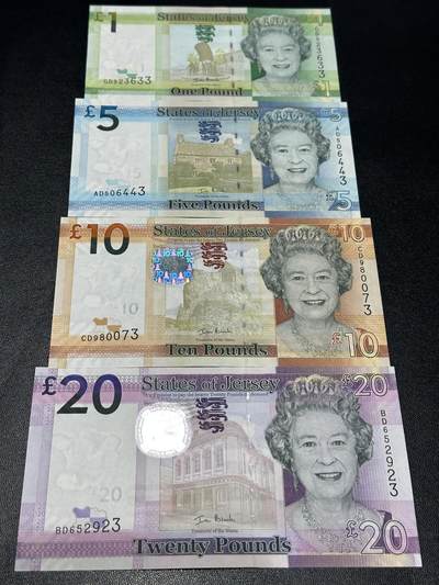 《外钞收藏家》第五百九十期（欧洲强钞、港币、硬通货及丰富裸币大拍场）（本平台长期征集拍品、欢迎藏友们联系合作） - 泽西1、5、10、20镑 4张一起 全新UNC 全部是靓号尾3 但1和20镑有轻微潮点