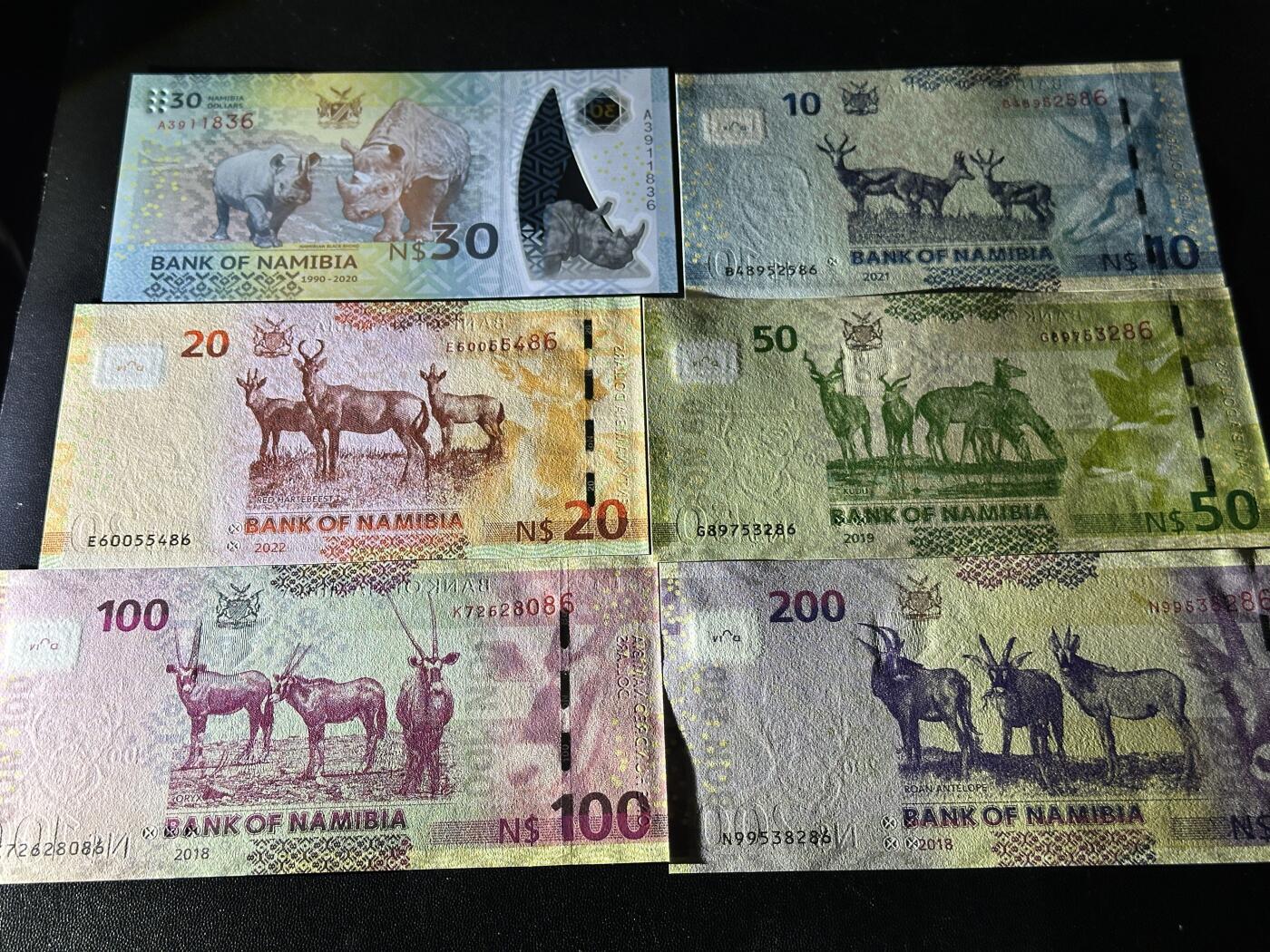 《外钞收藏家》第五百九十期（欧洲强钞、港币、硬通货及丰富裸币大拍场）（本平台长期征集拍品、欢迎藏友们联系合作） 纳米比亚10-200面额 六张一起 全新UNC 全部是靓号尾6 其中一张是纪念钞