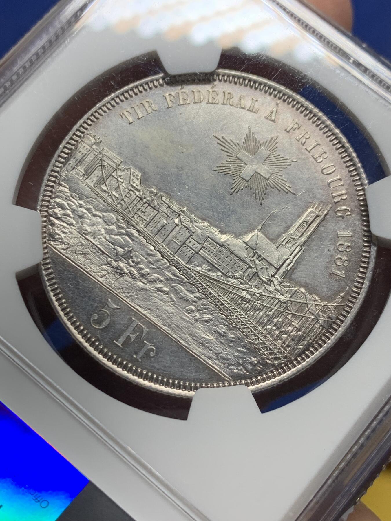 《竞宝斋》第444场 周日，周一，2场连拍 （全场包邮） NGC UNC 1881年瑞士弗莱堡射击节景观5法郎银币，双面PL状态不错。