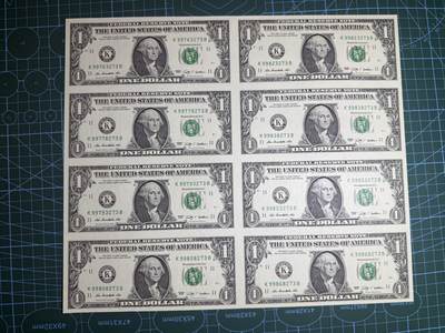 【炜奕收藏】，第五十二期 - 2009年美国1美元8连体，UNC品相，有轻微车轮印