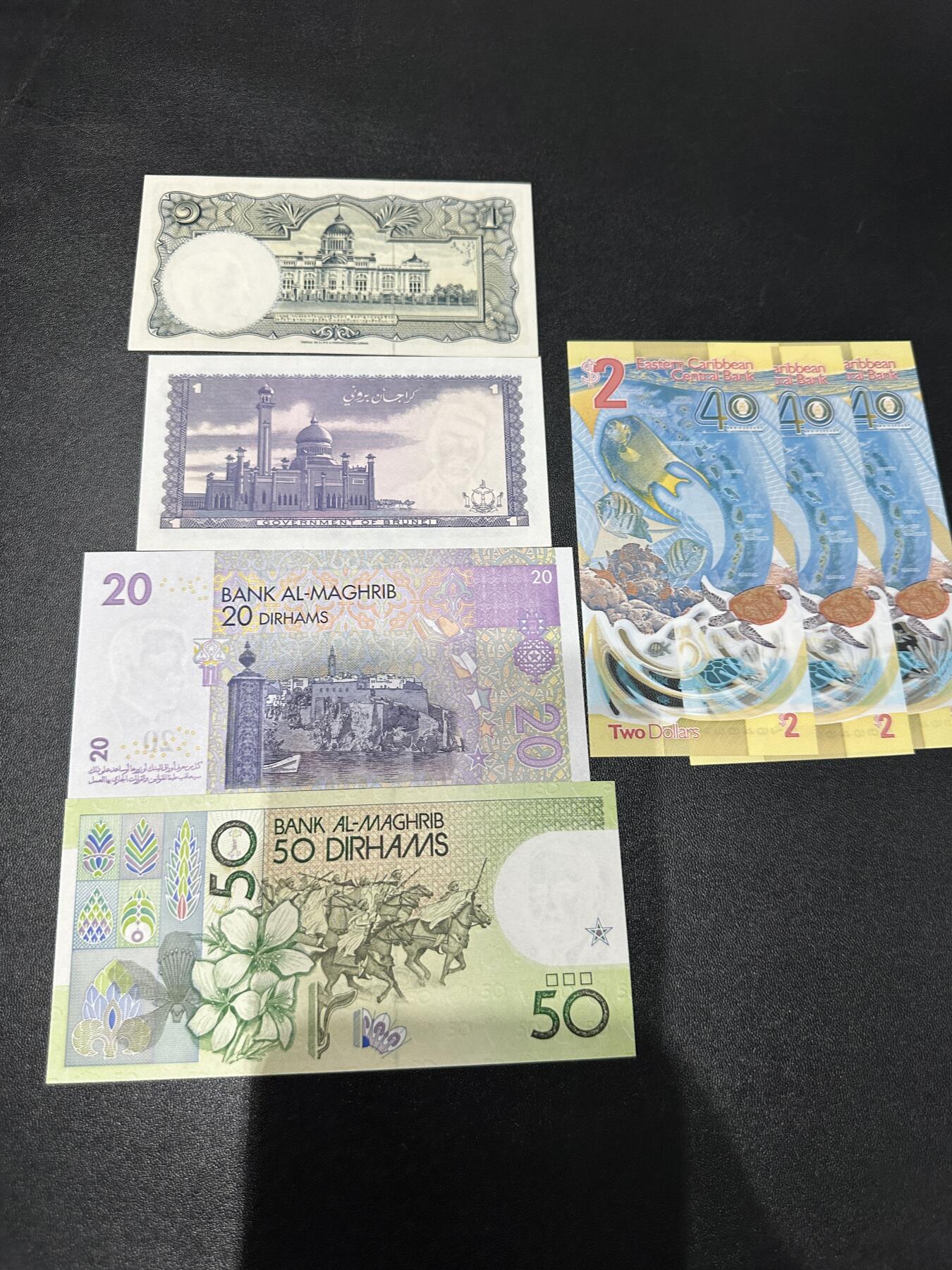 《外钞收藏家》第五百九十一期（畅拍场）（本平台长期征集拍品、欢迎藏友们联系合作） 泰国1泰铢+文莱1元+东加勒比2元3张+摩洛哥20、50 七张一起  全新