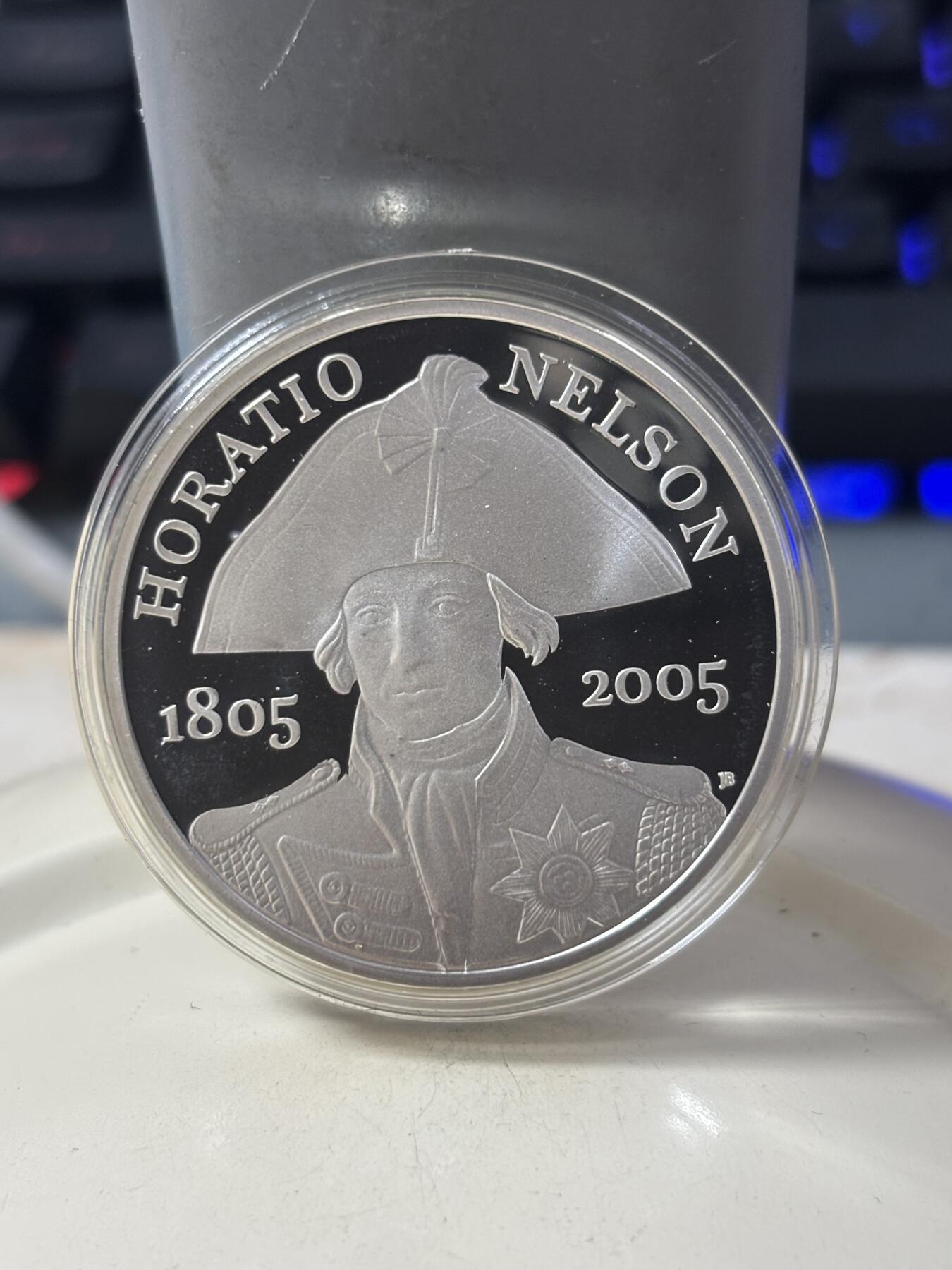 第184期拍卖  英国2005年纪念特拉法加海战2银一镍套币，925银，28.28克*2，,有瑕疵，银价725