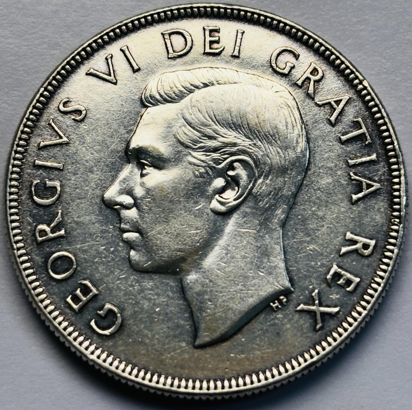 文馨钱币收藏第 283 场，【大雪鉴珍，寒英缀金】金银纪念币精品场，诚邀您的参与【长期接代拍品】 少见原光好品 1952 年英属加拿大乔治六世划船一元大银币，关门版，23.32 克 800 高银