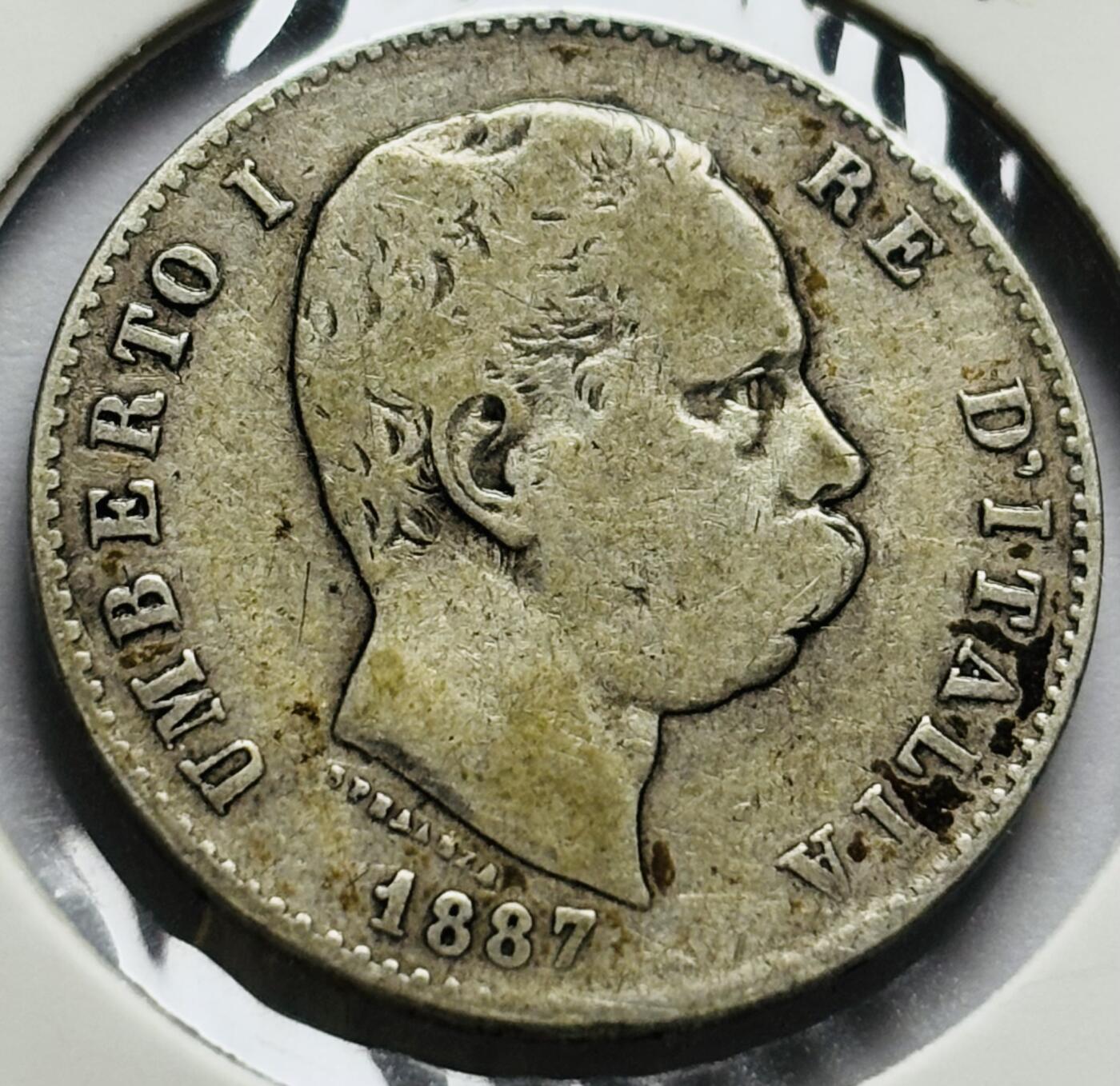 文馨钱币收藏第 283 场，【大雪鉴珍，寒英缀金】金银纪念币精品场，诚邀您的参与【长期接代拍品】 1887 年意大利翁贝托一世 1 里拉银币，独年份版，比较少