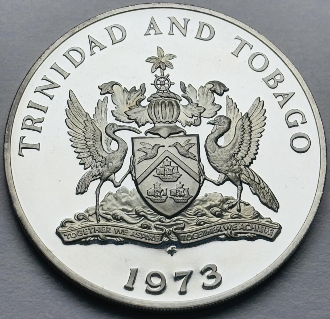 文馨钱币收藏第 283 场，【大雪鉴珍，寒英缀金】金银纪念币精品场，诚邀您的参与【长期接代拍品】 全新 1973 年特立尼达和多巴哥 5 元精制大银币，重 27.9 克 925 高银