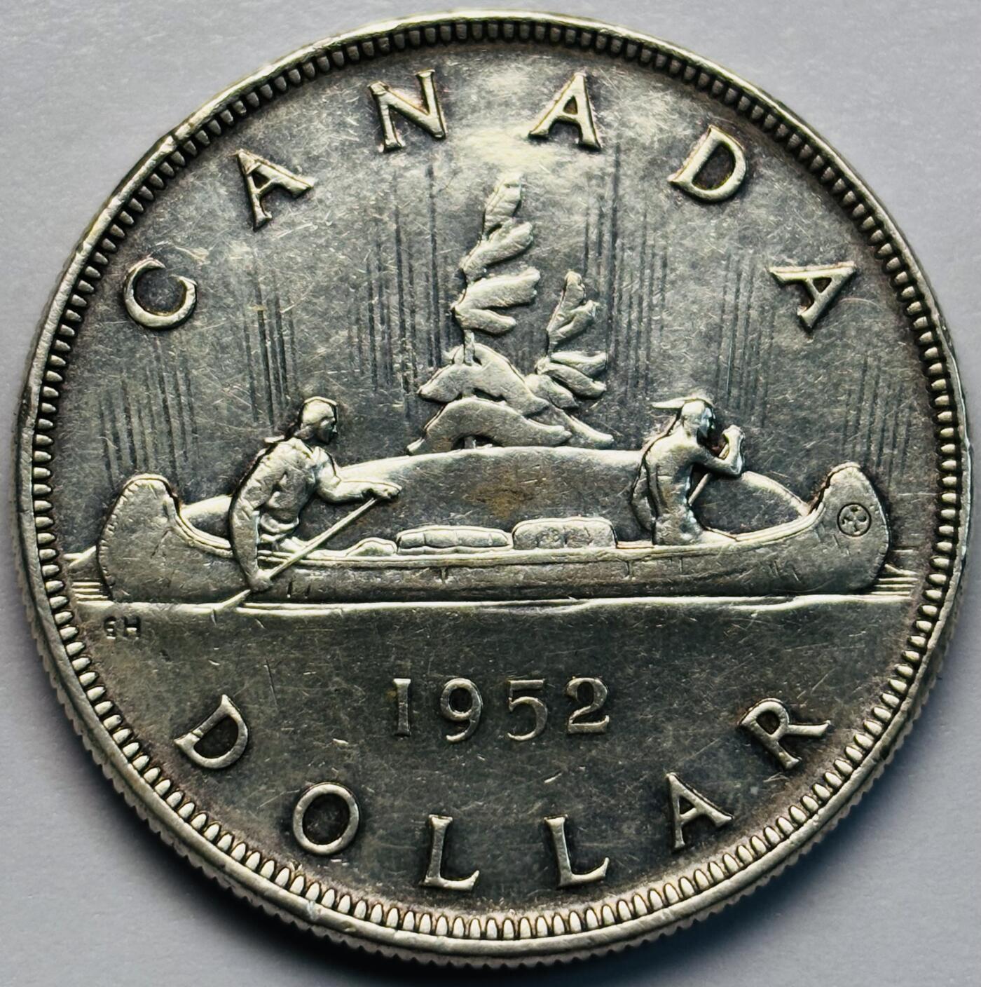 文馨钱币收藏第 283 场，【大雪鉴珍，寒英缀金】金银纪念币精品场，诚邀您的参与【长期接代拍品】 少见原光好品 1952 年英属加拿大乔治六世划船一元大银币，关门版，23.32 克 800 高银