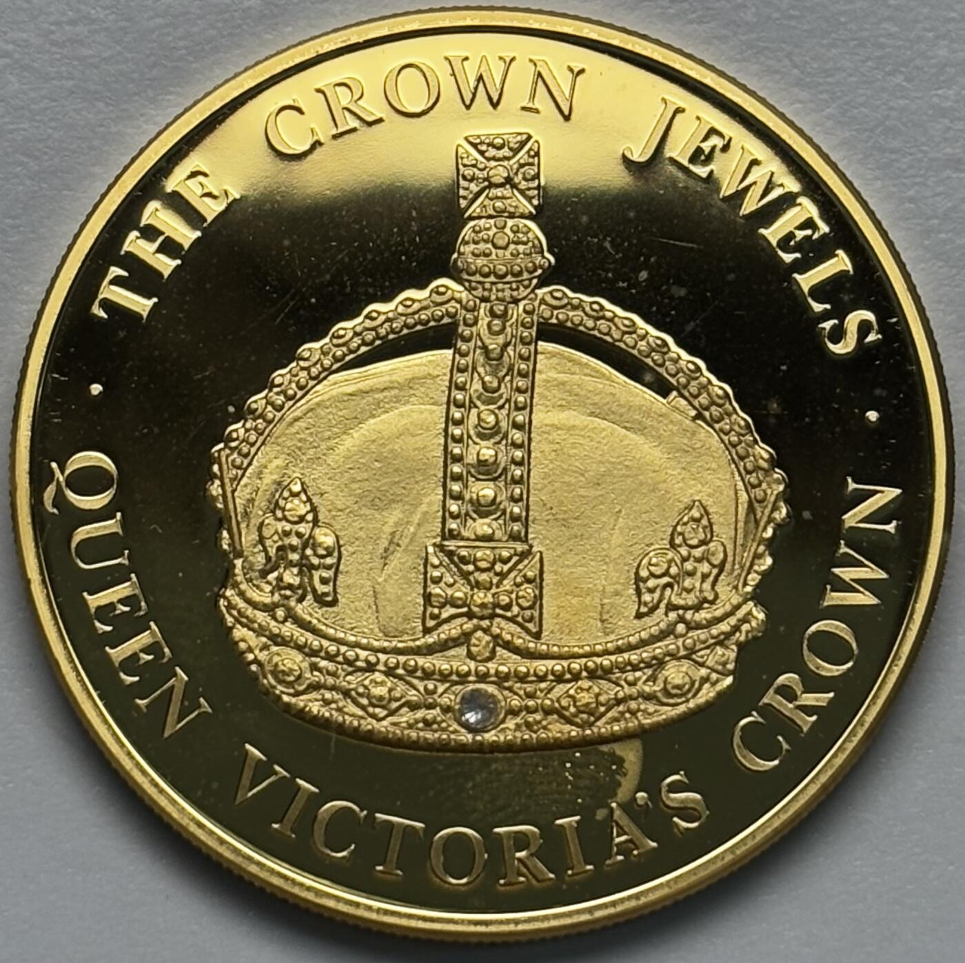 文馨钱币收藏第 283 场，【大雪鉴珍，寒英缀金】金银纪念币精品场，诚邀您的参与【长期接代拍品】 全新 2004 年特克斯和凯克斯群岛 5 克朗精制镀金纪念币