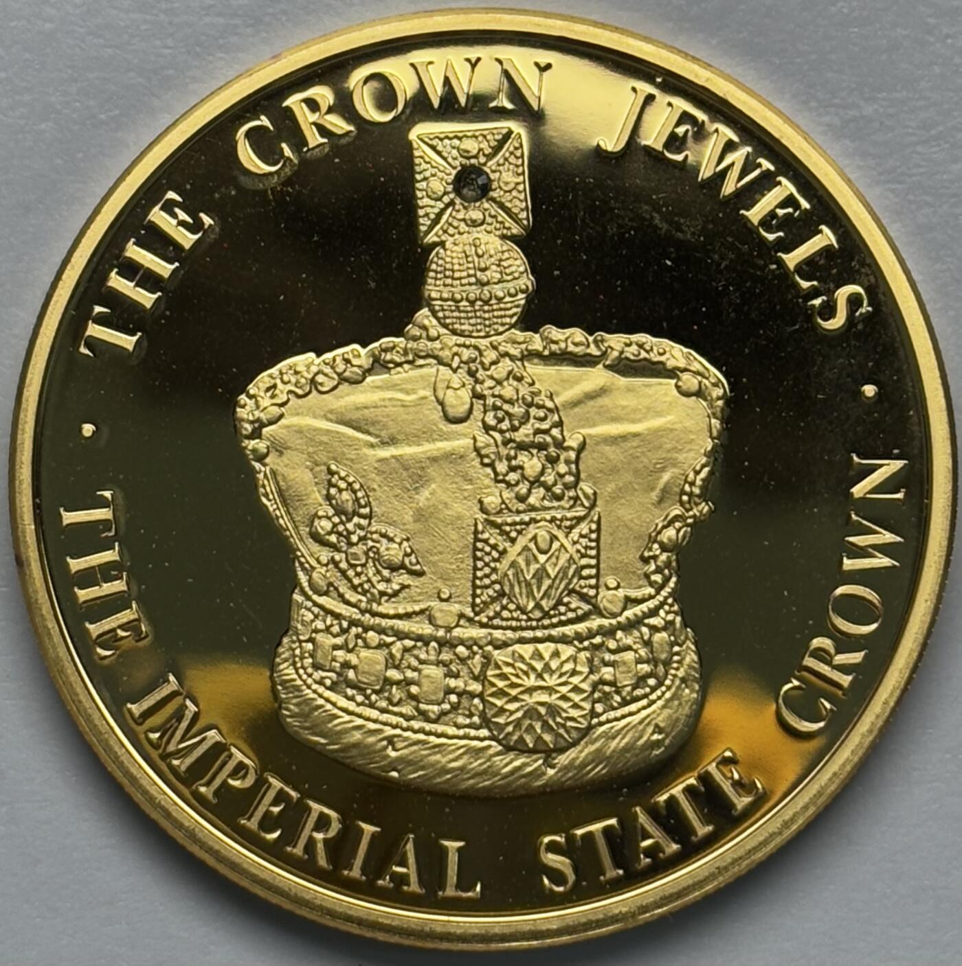 文馨钱币收藏第 283 场，【大雪鉴珍，寒英缀金】金银纪念币精品场，诚邀您的参与【长期接代拍品】 全新 2004 年特克斯和凯克斯群岛 5 克朗精制镀金纪念币