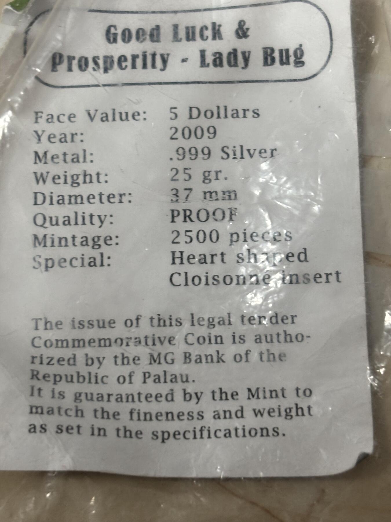 第184期拍卖 帕劳2009年幸运瓢虫彩色心形精制纪念银币带证书，999银，25克，发行量2500枚，有氧化