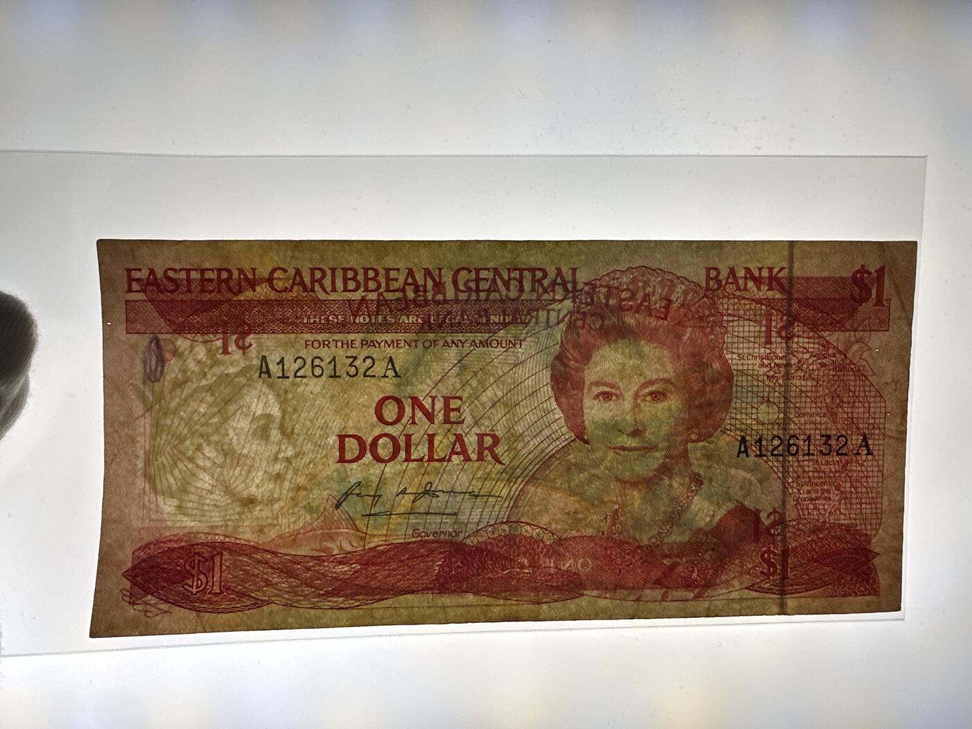 12.5纸币专场 北美洲东加勒比1元1985年A冠