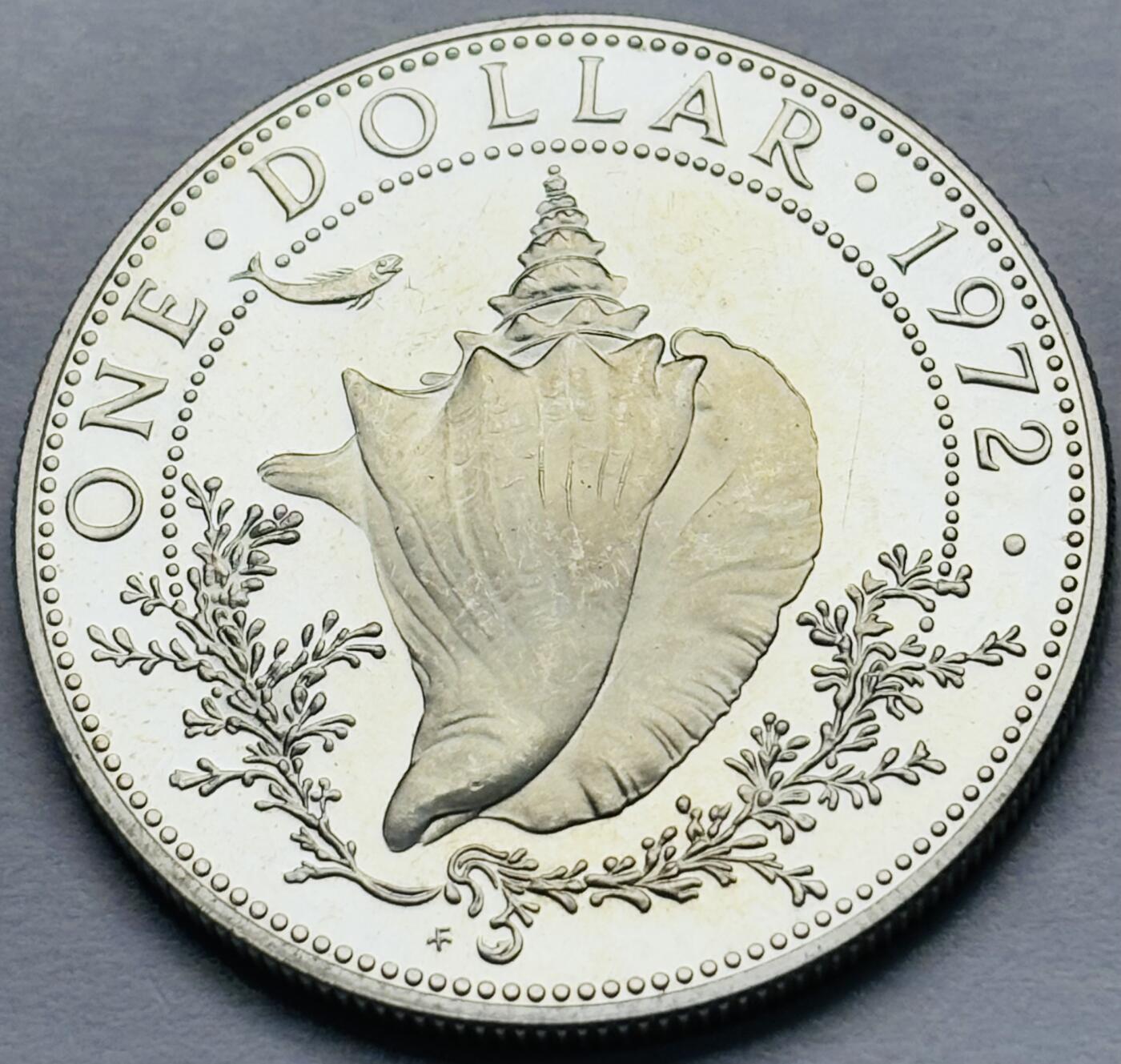 文馨钱币收藏第 283 场，【大雪鉴珍，寒英缀金】金银纪念币精品场，诚邀您的参与【长期接代拍品】 原光品相 1972 年巴哈马一元精制银币，第二版只发行三年，18.14 克 800 高银