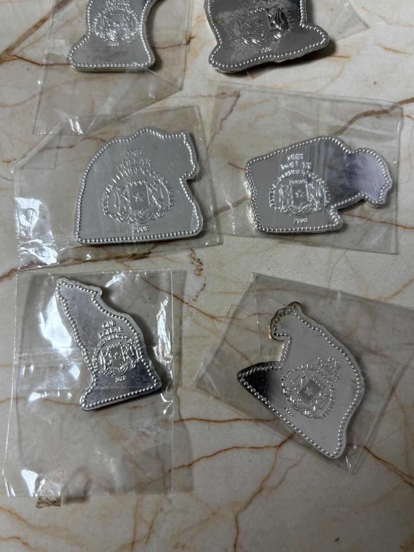 第184期拍卖 获奖索马里2008年动物彩色异形镀银纪念币6枚套，世界最美25种钱币排名第12位