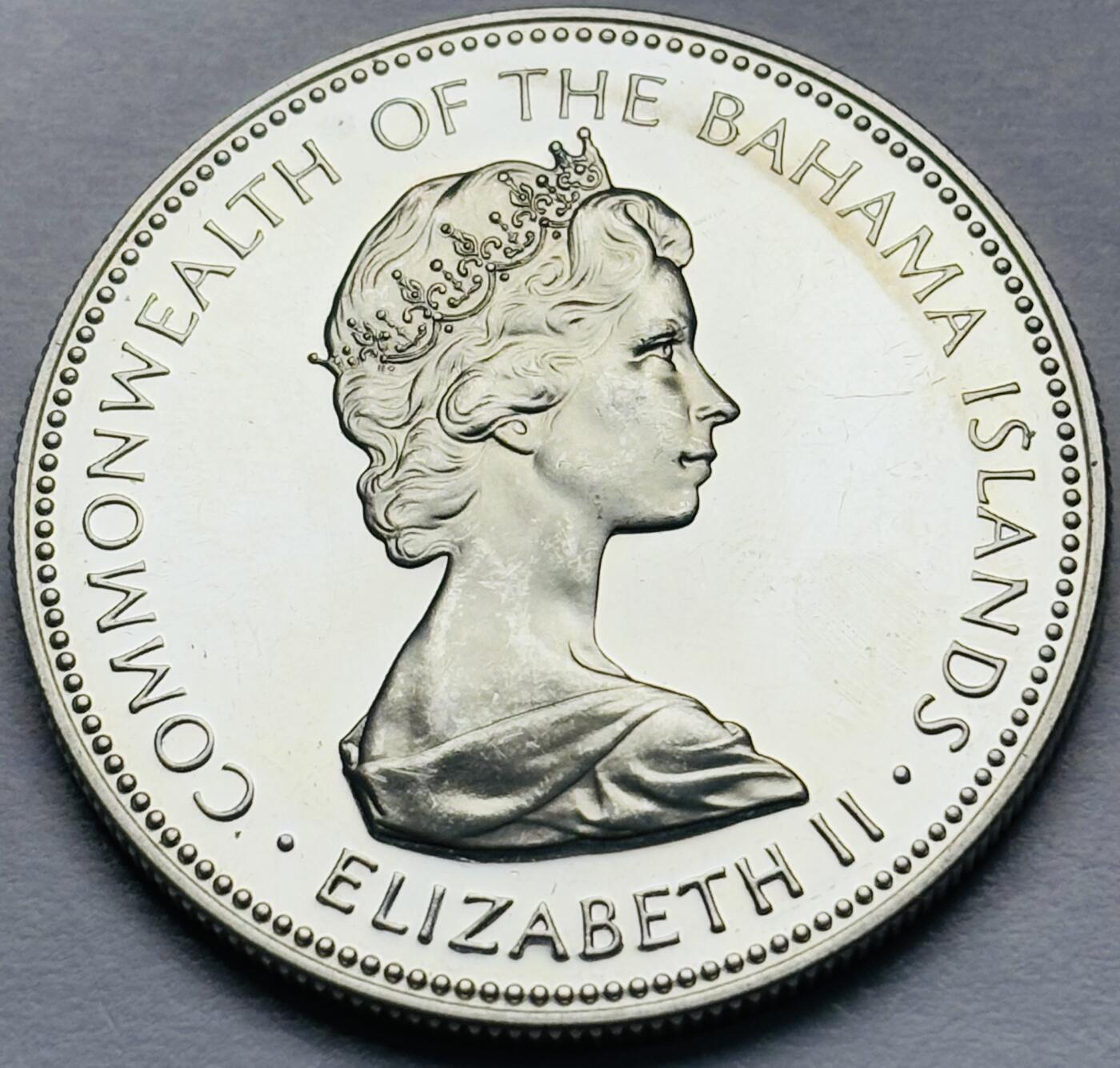 文馨钱币收藏第 283 场，【大雪鉴珍，寒英缀金】金银纪念币精品场，诚邀您的参与【长期接代拍品】 原光品相 1972 年巴哈马一元精制银币，第二版只发行三年，18.14 克 800 高银