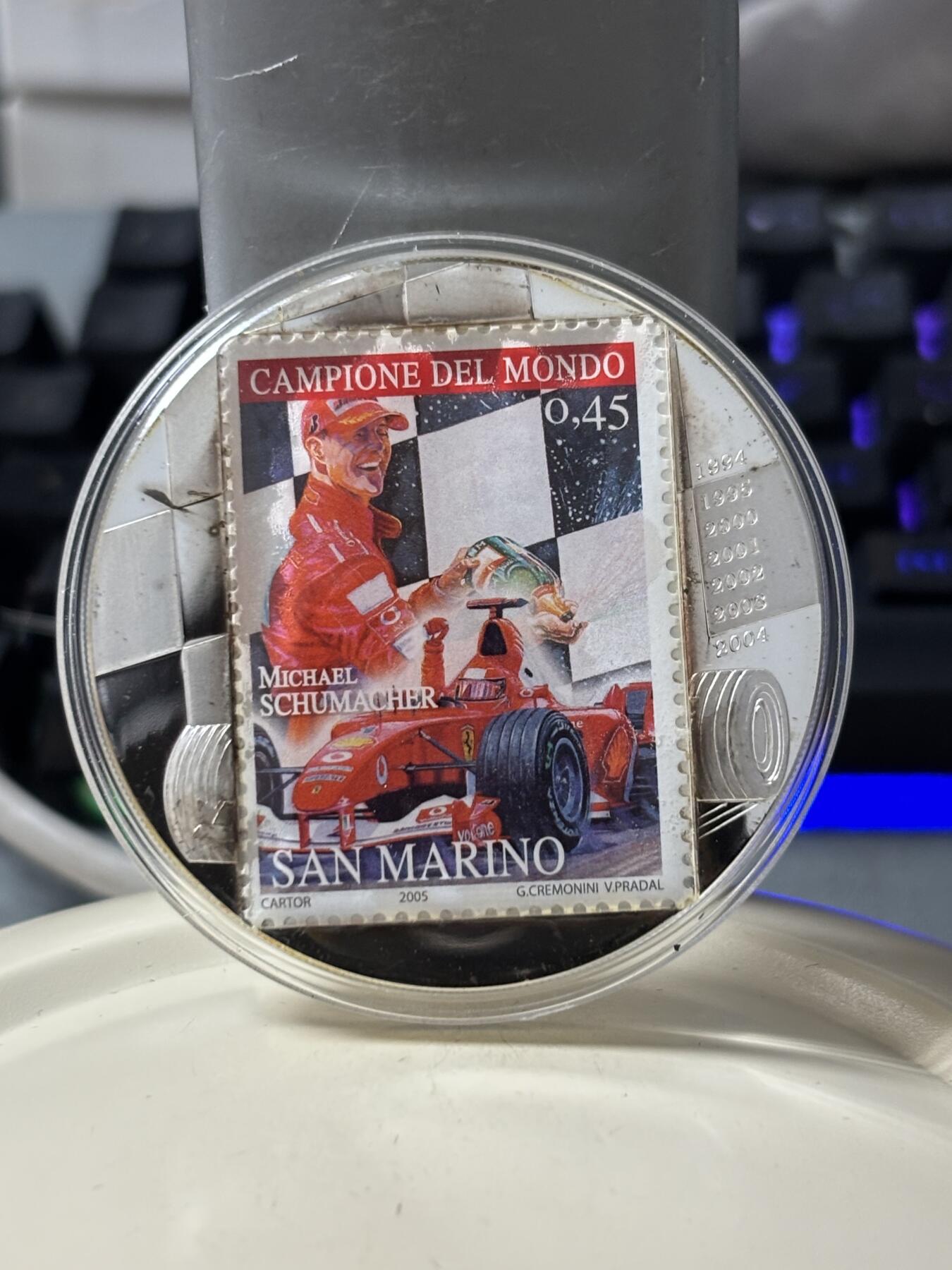 第184期拍卖 刚果2007年舒马赫彩色赛车邮票2盎司精致大银币带证书，925银银价798，发行999枚，有氧化