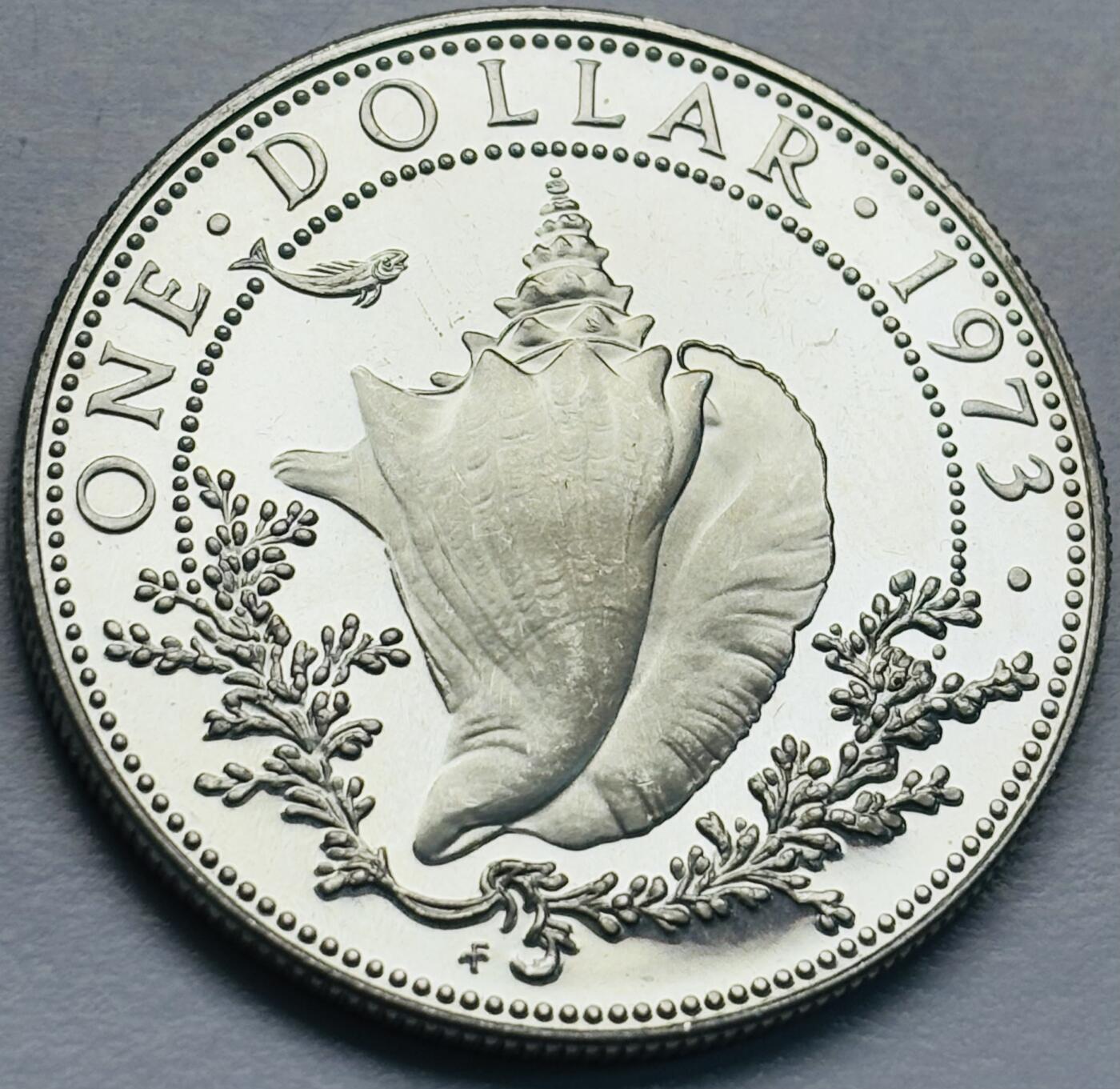 文馨钱币收藏第 283 场，【大雪鉴珍，寒英缀金】金银纪念币精品场，诚邀您的参与【长期接代拍品】 原光品相 1973 年巴哈马一元精制银币，第二版关门版只发行三年，18.14 克 800 高银