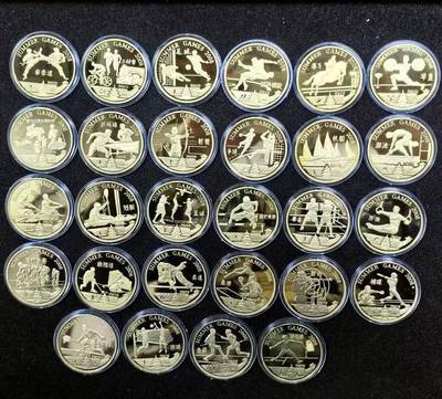 北京马甸外国币专卖第147期，外国币，中国机制银元，中国早期纪念币专场，陆续上拍，欢迎关注 - 2008年朝鲜发行纪念北京奥运会28个体育项目28枚大铜币大全套，其中有显著错误的币有四枚：铁人三项赛写成了三种赛，跆拳道写成了泰拳道，舤船写成舤艇，跳水的图案配了游泳项目，等等。引来众多收藏者的关注与收藏，