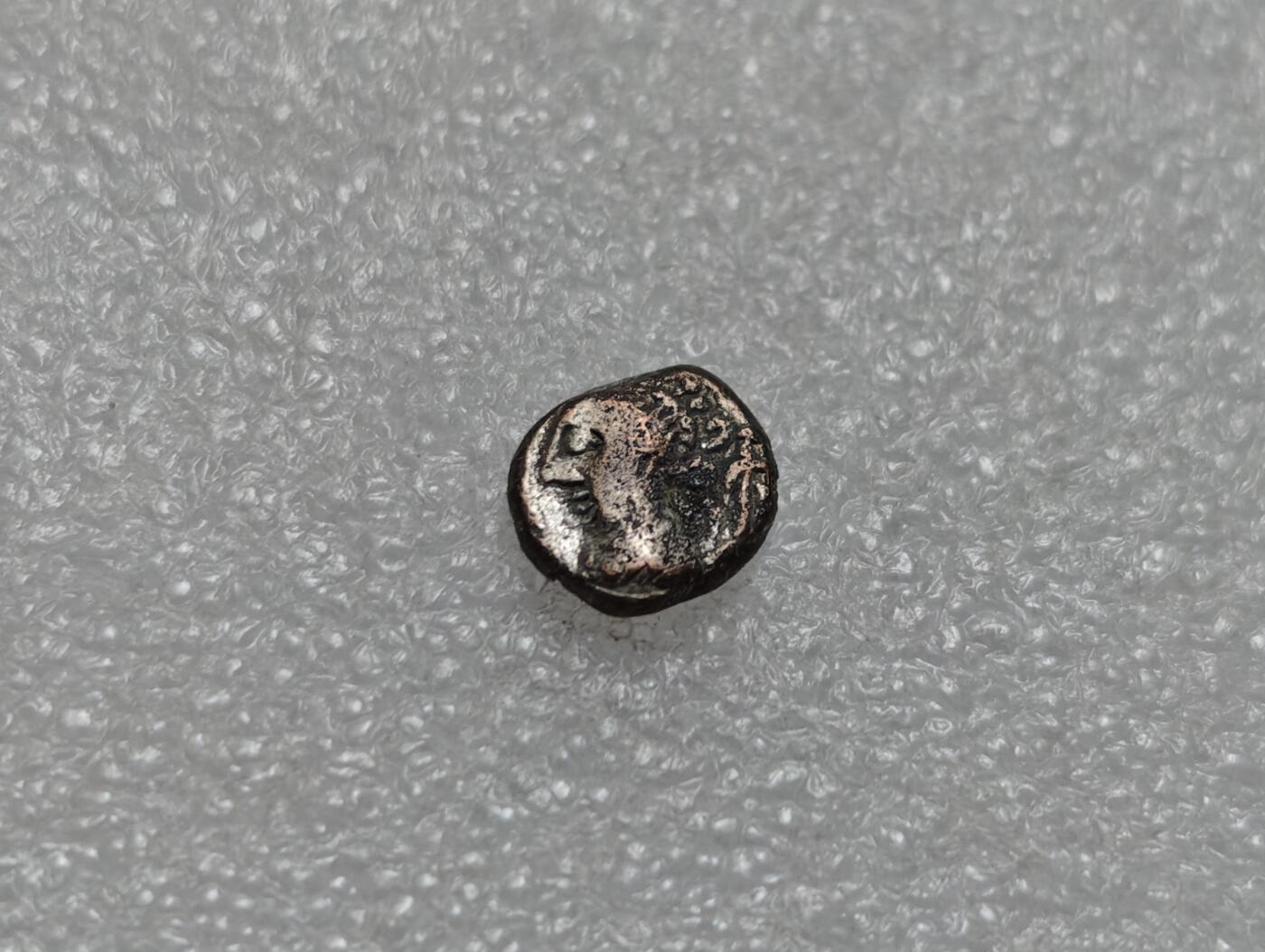 瓶子🏺第219期拍卖会  埃兰王朝打制铜币  侧脸