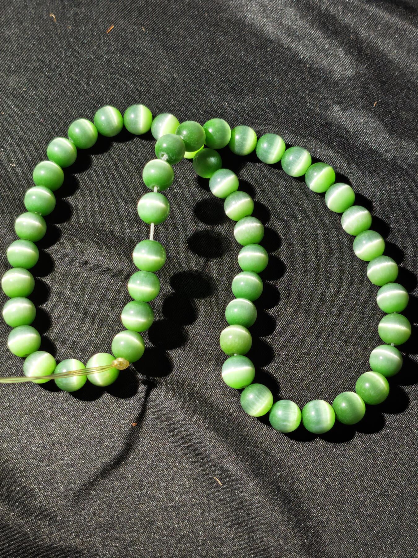 91期回流戒指饰品杂件纪念章丝路钱币专场 猫眼饰品