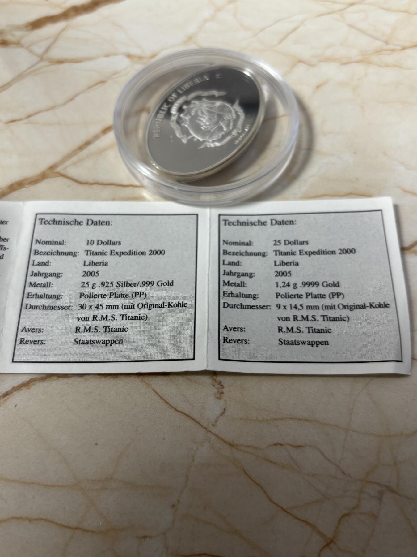 第184期拍卖 利比里亚2005年镶嵌泰坦尼克号打捞煤块镀金版银币带证书，925银镀999金，25克