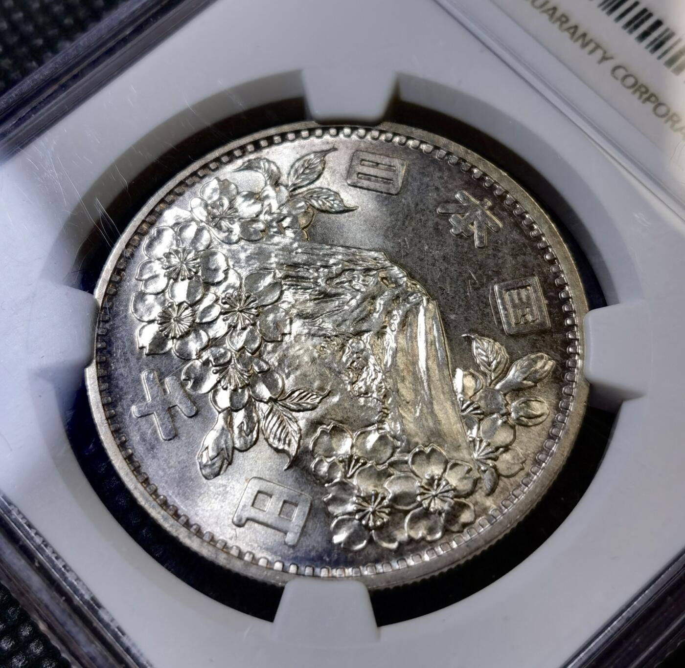 甄臻铺-世界币章拍卖（第42期）送拍享返佣金等优惠多多 NGC-MS64 日本1964年东京奥运1000元银币 高分车轮转光