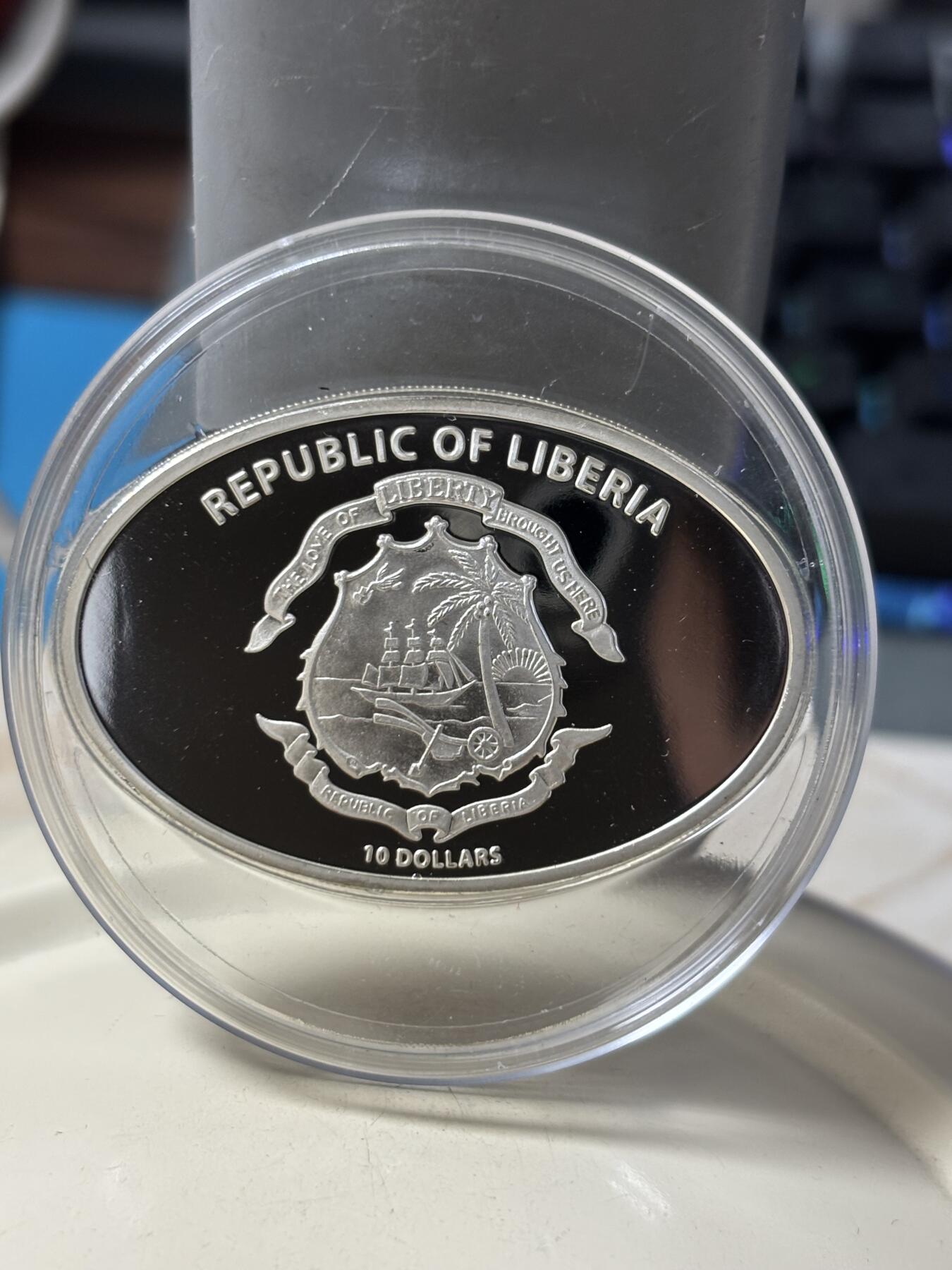 第184期拍卖 利比里亚2005年镶嵌泰坦尼克号打捞煤块镀金版银币带证书，925银镀999金，25克