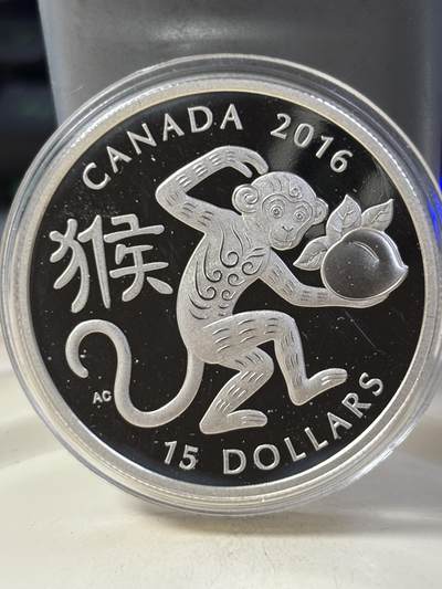 第184期拍卖 - 加拿大2016年中国生肖系列猴年猴子偷桃1盎司银币，9999银，31.39克，发行18888枚，有氧化