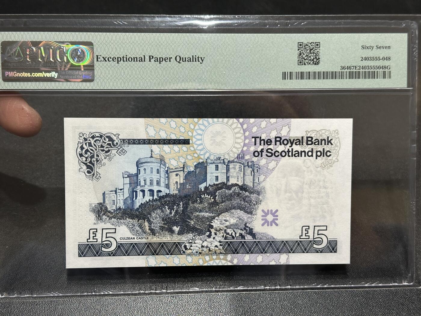 《外钞收藏家》第五百九十一期（畅拍场）（本平台长期征集拍品、欢迎藏友们联系合作） 2005年苏格兰5镑 纪念钞 PMG67 圆圆号 百位号818