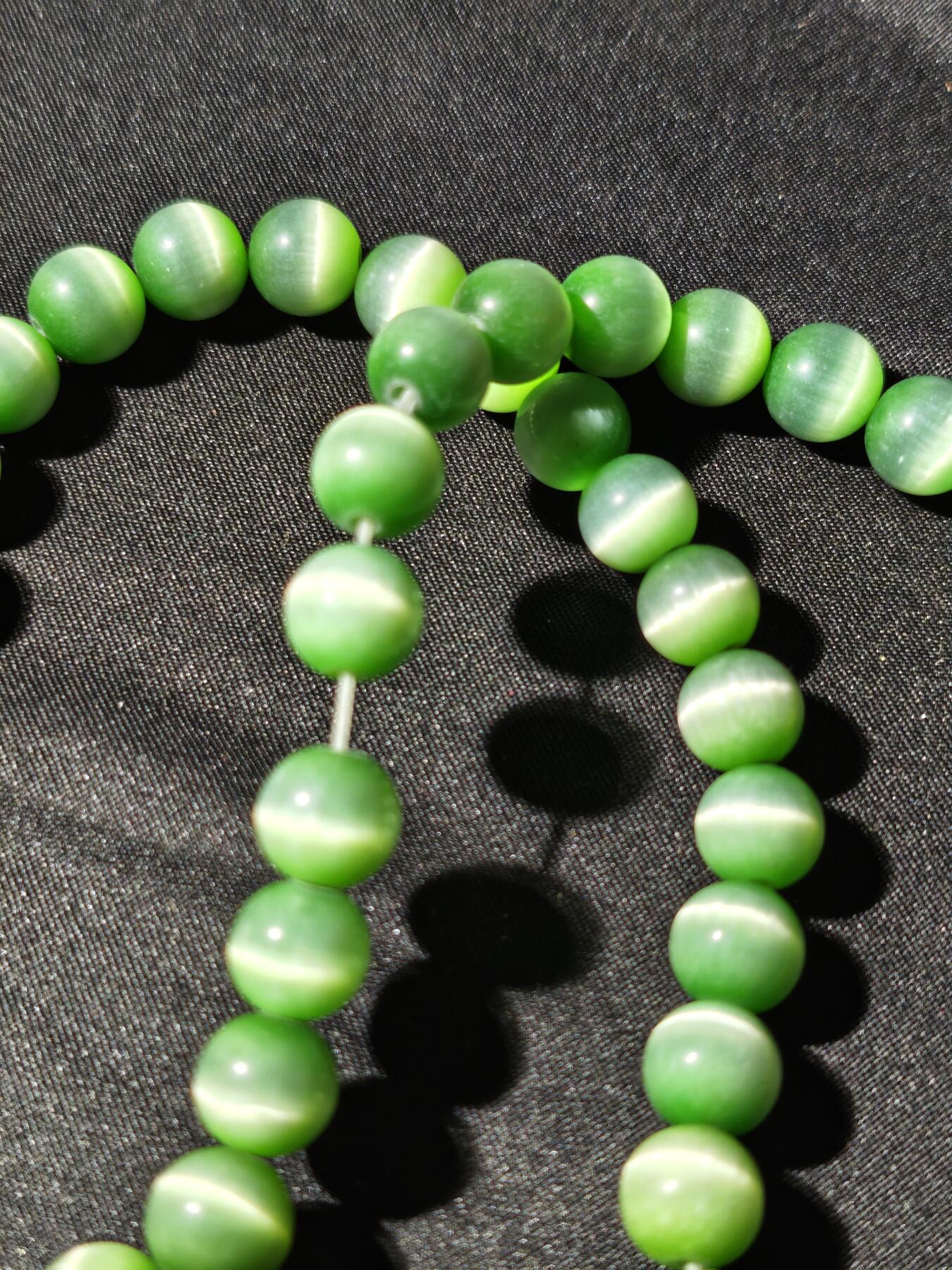 91期回流戒指饰品杂件纪念章丝路钱币专场 猫眼饰品